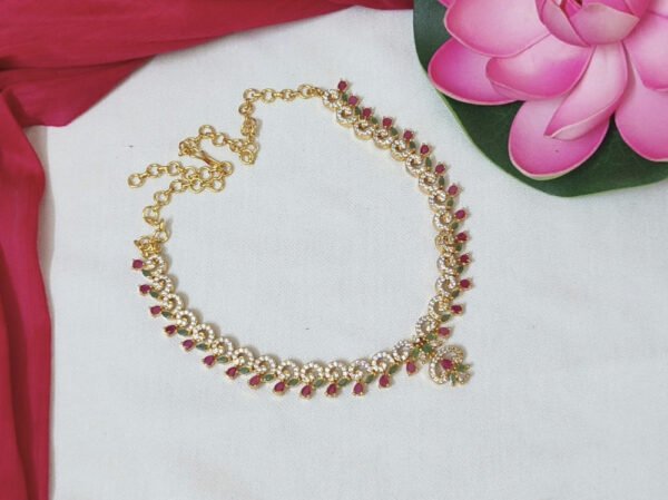 Traditional gold tone AD stones set