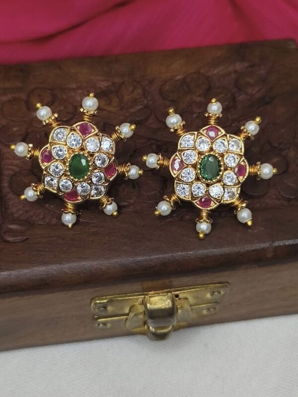 Pearl studs.