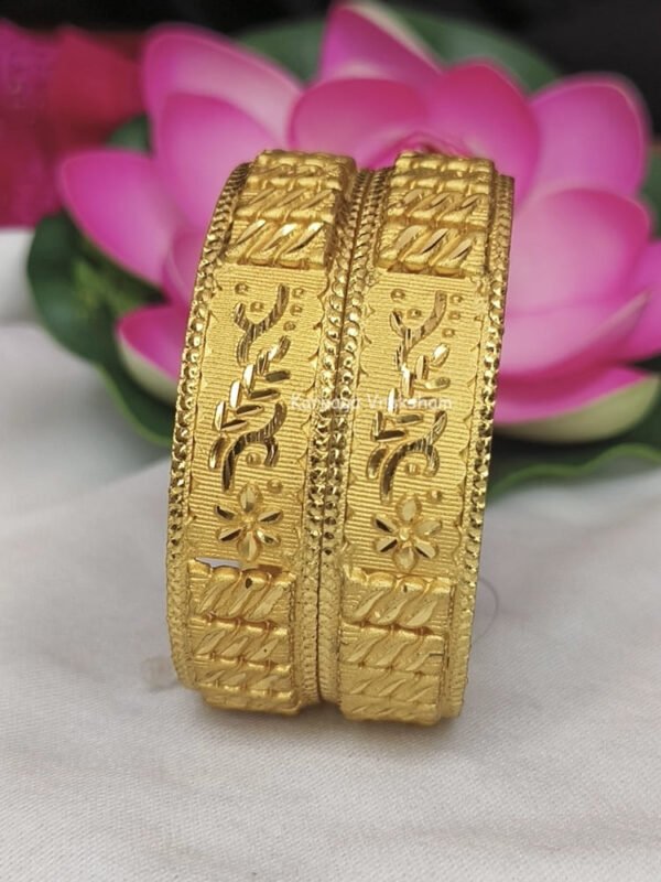 Gold like kada bangles.